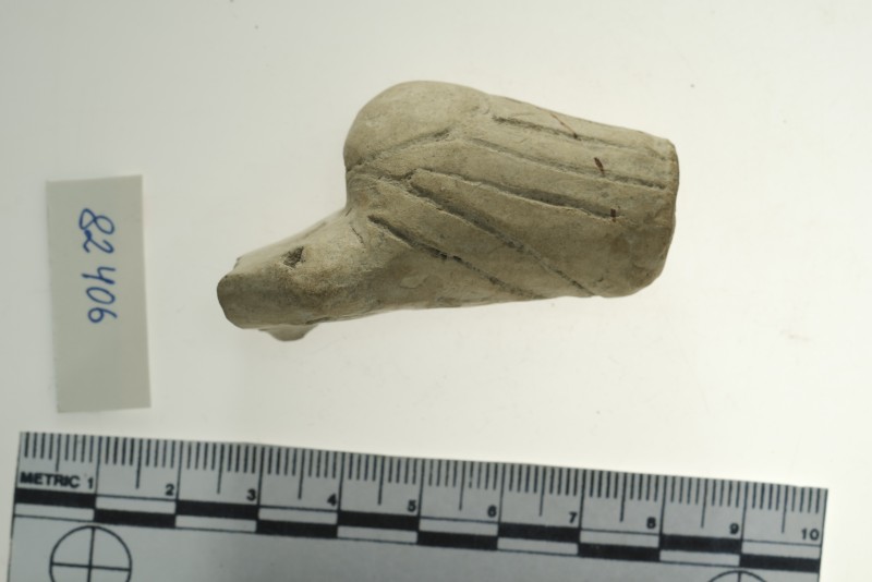 Фрагмент антропоморфної статуетки