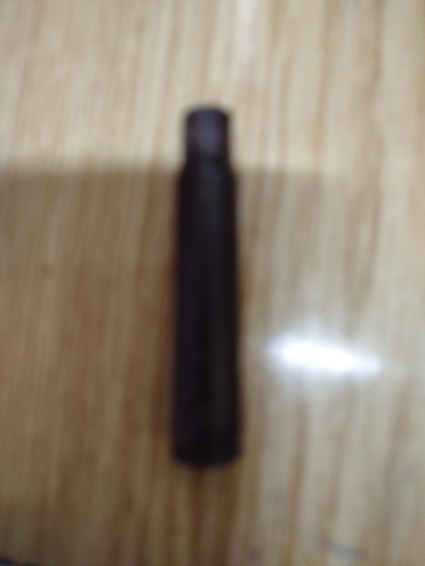 Гільза від кулеметного патрона.