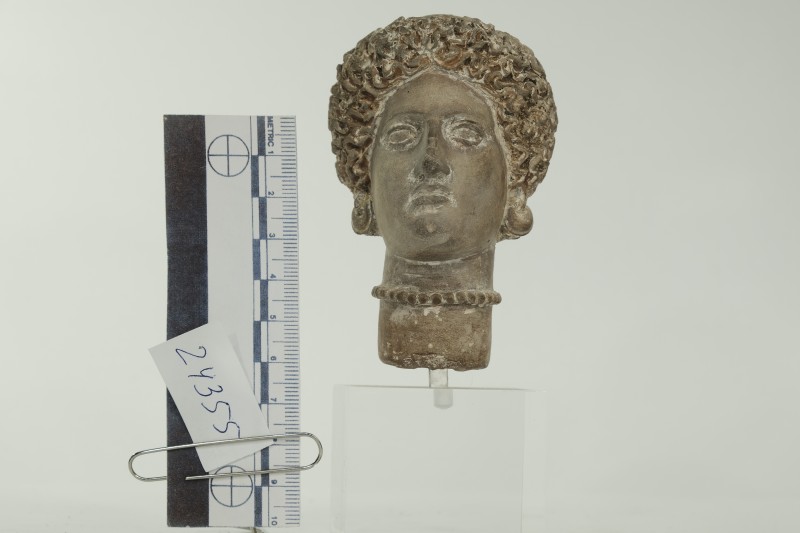 Теракота. Головка жіночої статуетки