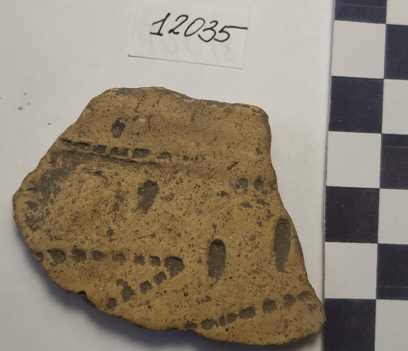 Фрагмент стінки ліпної жовтоглиняної посудини