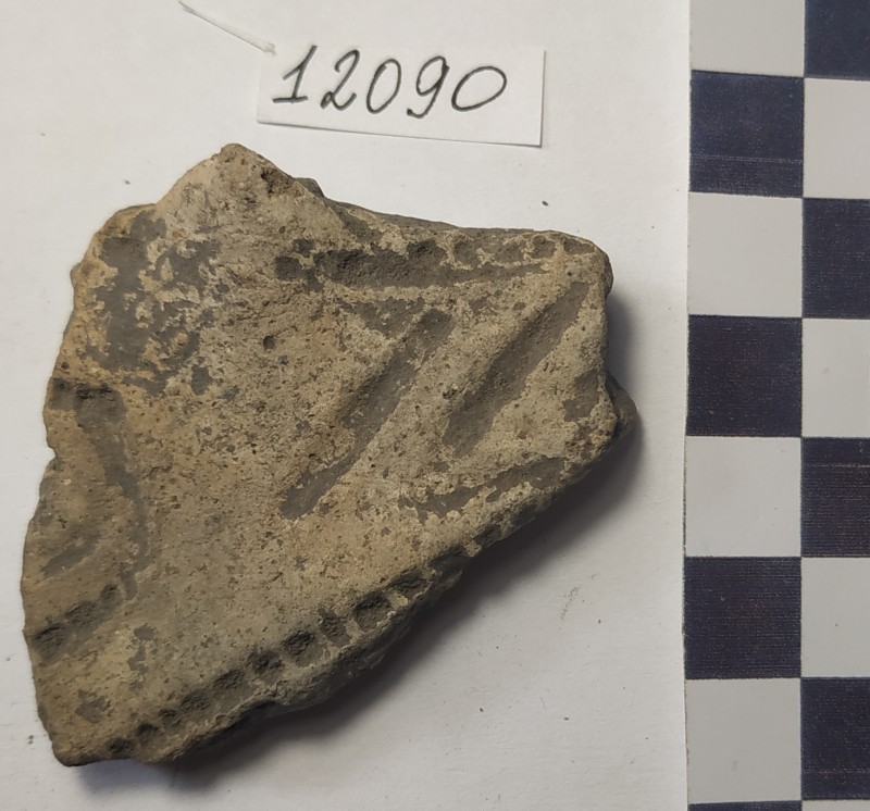 Фрагмент стінки ліпної жовтоглиняної посудини