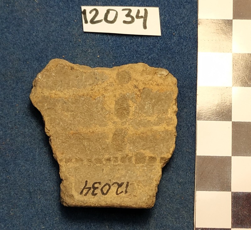 Фрагмент піддону  жовтоглиняної фруктовниці