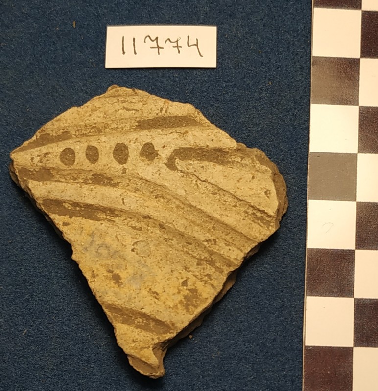 Фрагмент стінки ліпної сіроглиняної посудини