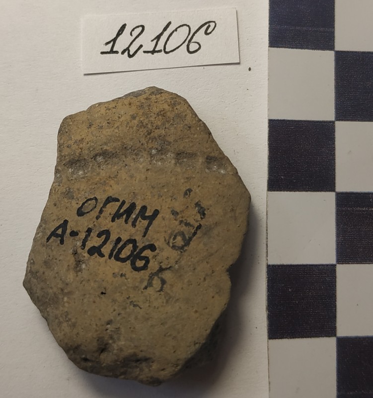 Фрагмент придонної частини ліпної жовтоглиняної посудини