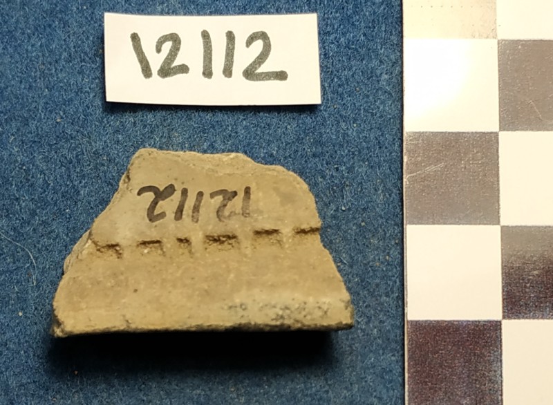 Фрагмент вінець ліпної сіроглиняної  посудини