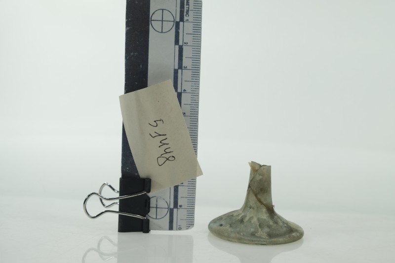 Нижня частина скляної посудини