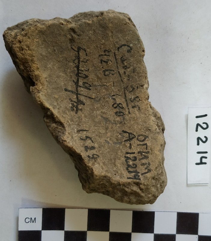 Фрагмент придонної частини ліпної сіро глиняної посудини