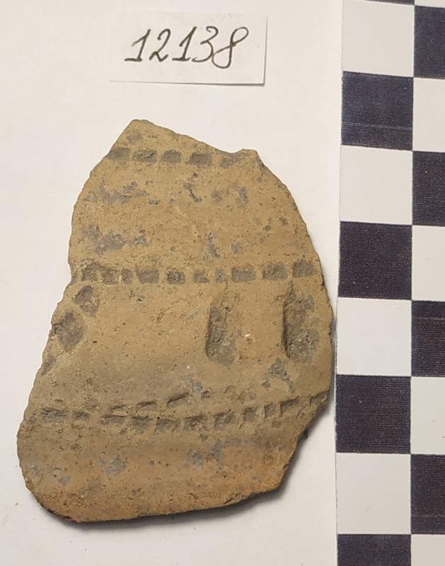 Фрагмент стінки ліпної жовтоглиняної посудини