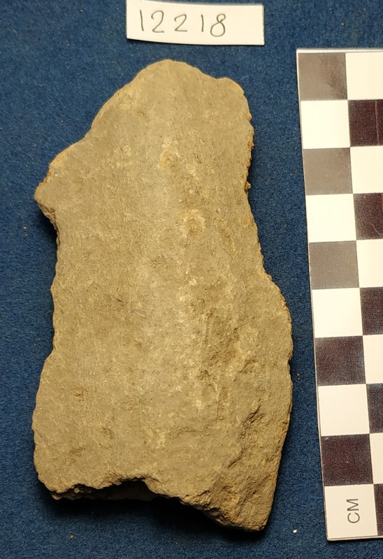 Фрагмент дна ліпної кухонної жовтоглиняної посудини