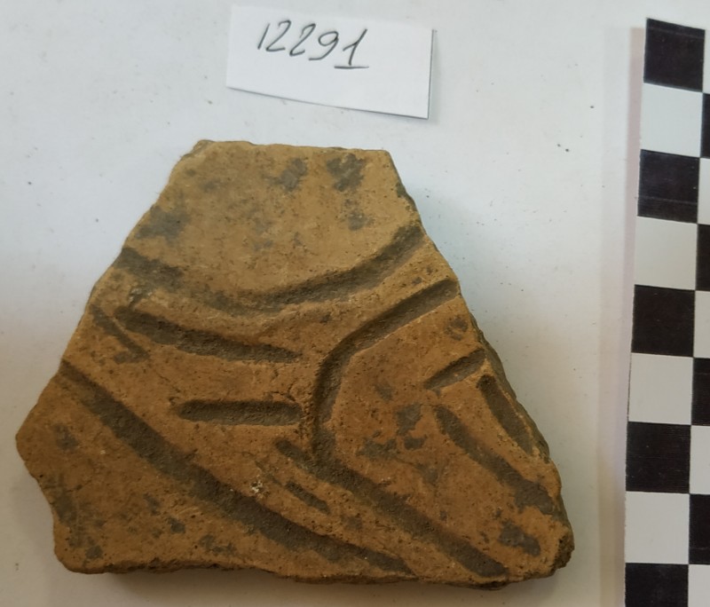 Фрагмент стінки ліпної жовтоглиняної посудини