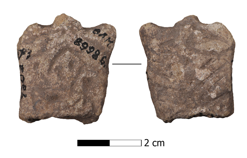 Фрагмент верхньої частини антропоморфної статуетки.