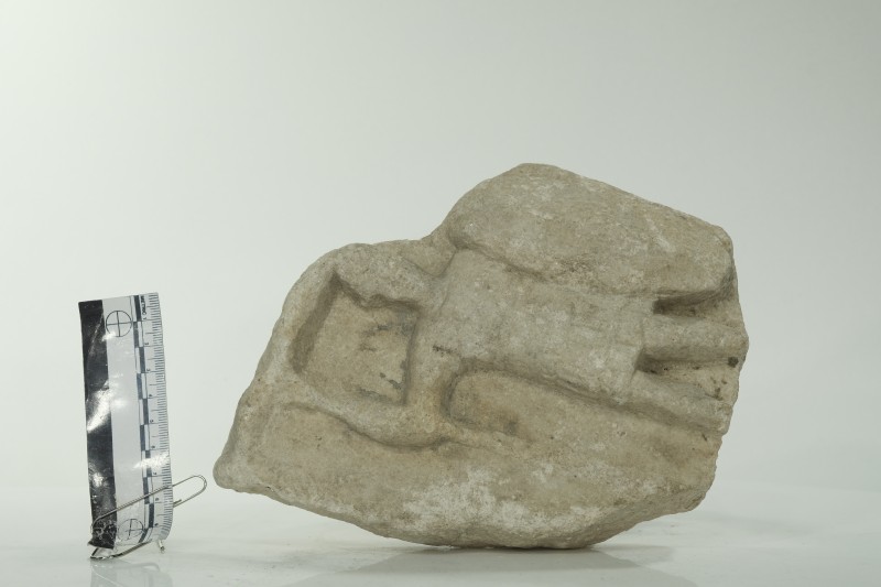 Фрагмент рельєфа із зображенням воїна з гальським щитом