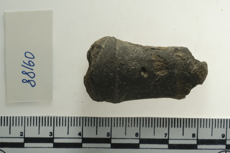 Фрагмент верхньої частини фігурки