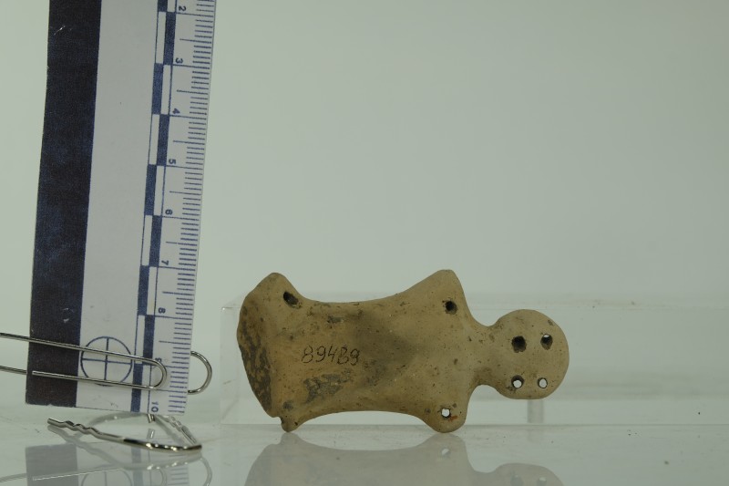 Фрагмент антропоморфної статуетки