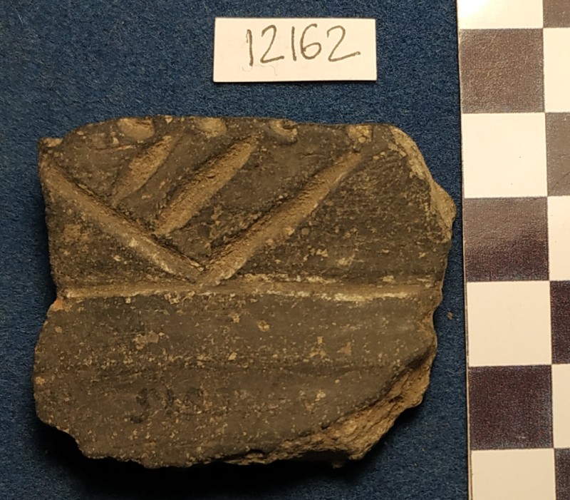 Фрагмент вінець ліпної лощеної сіроглиняної посудини