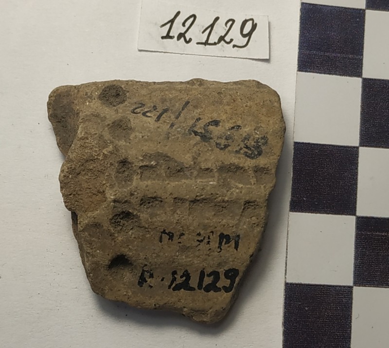 Фрагмент стінки ліпної сіроглиняної посудини