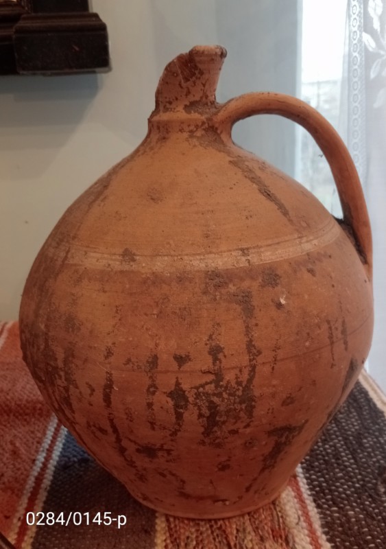 Глиняна тиква з вузькою горловиною