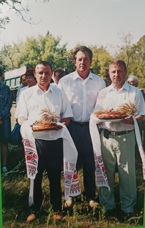 Фото керівників району та селища Устинівка (2005 рік).