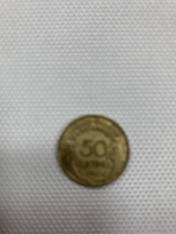 Монета номіналом 50 сантимів 1932 р.в.