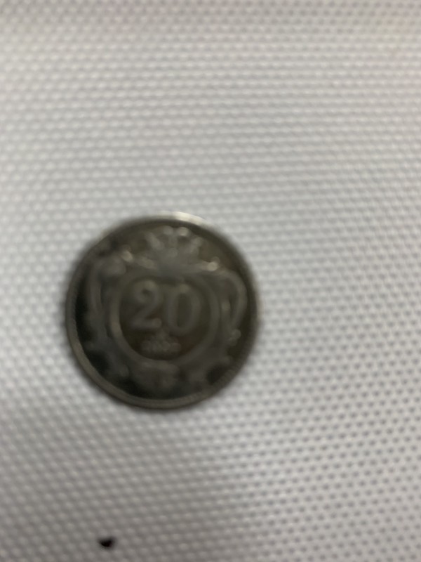 Монета номіналом 20 філерів 1907 р.в.
